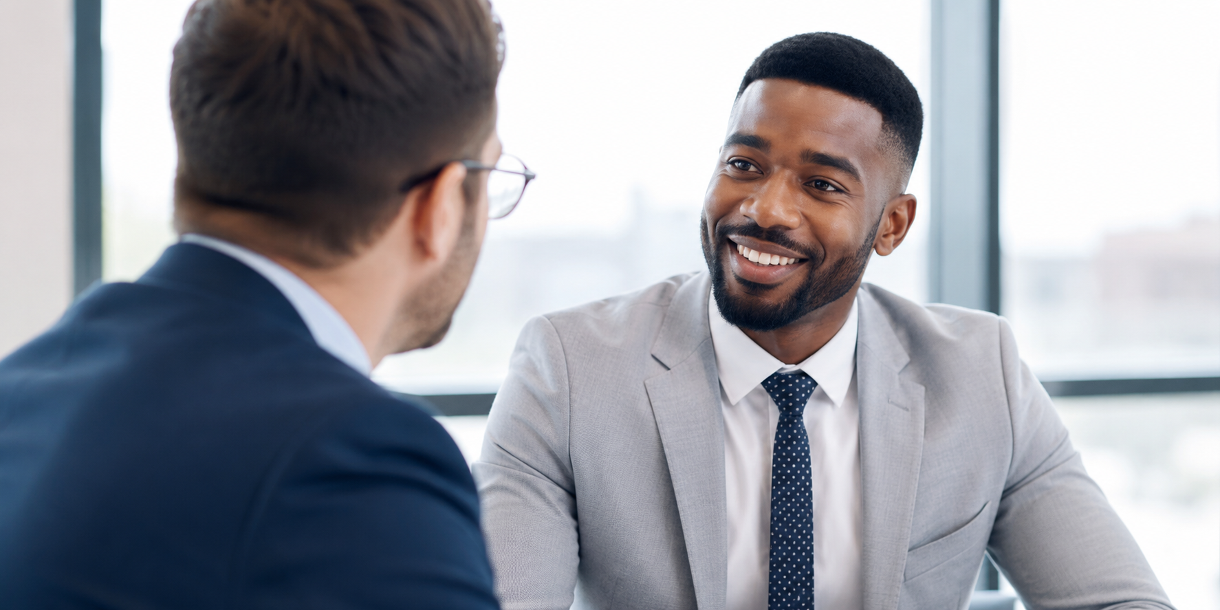 smiling business professional meeting